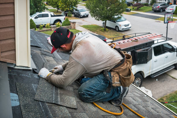 Professional Roofing technician working in Horton, MI